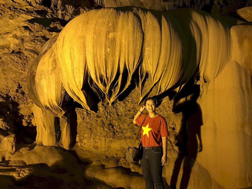 The most prominent feature in the cave is the upside-down lotus-shaped stalactite